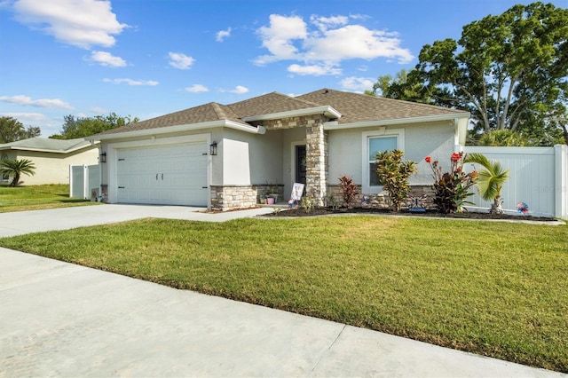 view of front of home featuring a front yard, a garage, fence, stone siding, and stucco siding
