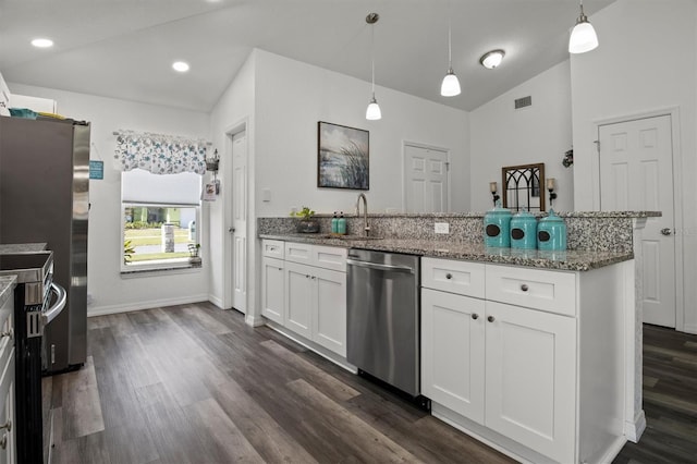 kitchen with dark wood-style flooring, a sink, stainless steel appliances, lofted ceiling, and visible vents