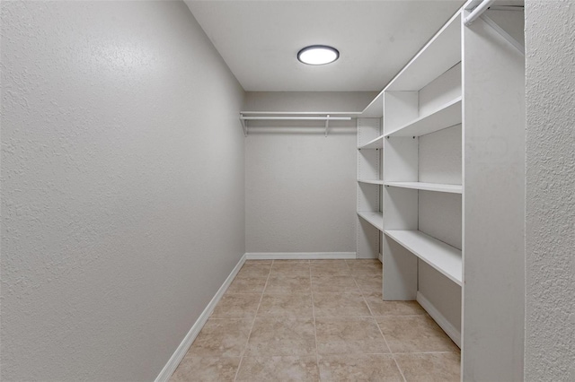 6317 Discovery Ln, Land O Lakes, FL 34638 - spacious closet featuring light tile patterned floors