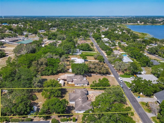 aerial view featuring a water view and a residential view