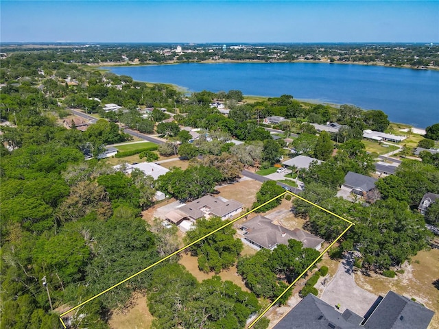 bird's eye view featuring a water view and a residential view