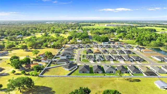 birds eye view of property with a residential view