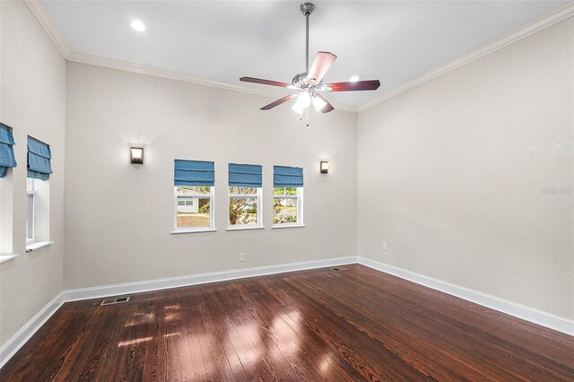 unfurnished room featuring visible vents, ornamental molding, ceiling fan, and wood finished floors