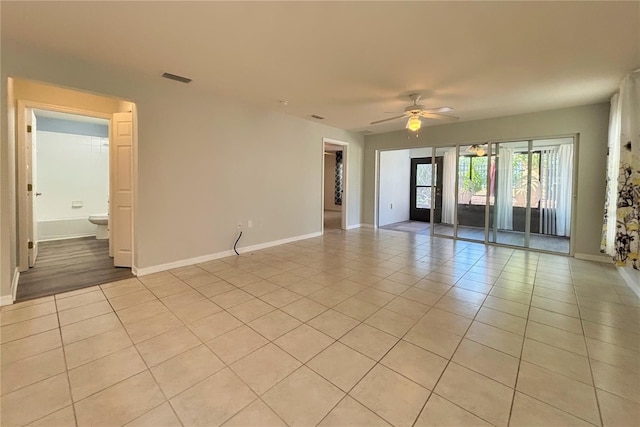4480 Turnberry Ln, Lake Wales, FL 33859 - unfurnished room featuring light tile patterned flooring, a ceiling fan, and baseboards