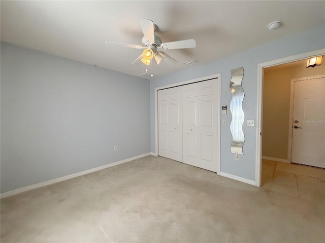 4480 Turnberry Ln, Lake Wales, FL 33859 - unfurnished bedroom featuring baseboards, ceiling fan, light carpet, and a closet