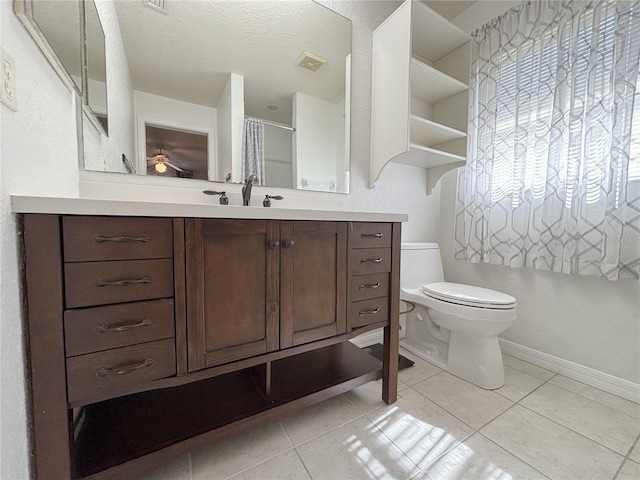 4480 Turnberry Ln, Lake Wales, FL 33859 - bathroom with toilet, baseboards, visible vents, and vanity