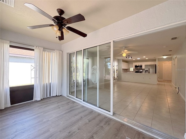 4480 Turnberry Ln, Lake Wales, FL 33859 - unfurnished sunroom featuring a wealth of natural light and visible vents