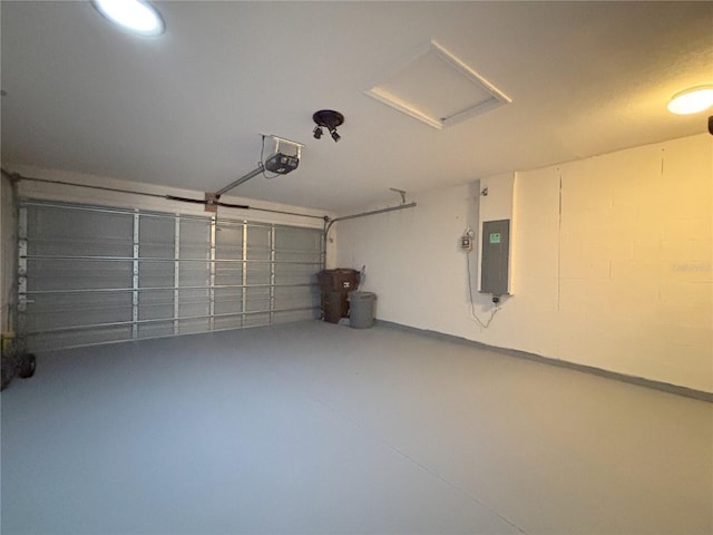 4480 Turnberry Ln, Lake Wales, FL 33859 - garage featuring a garage door opener and electric panel