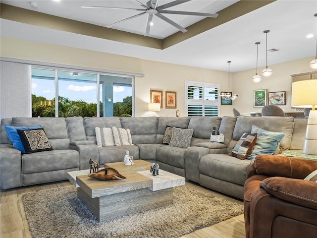 living room with recessed lighting, ceiling fan, and light wood-style floors