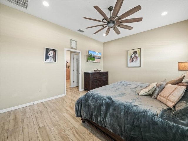 bedroom featuring visible vents, recessed lighting, baseboards, and wood finished floors