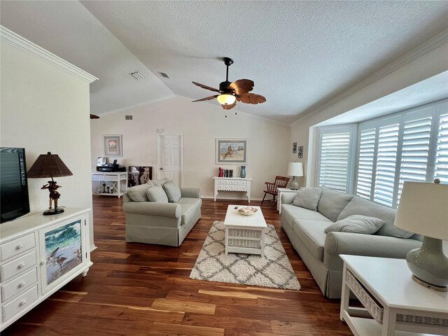 living area featuring visible vents, ornamental molding, ceiling fan, and dark wood-type flooring