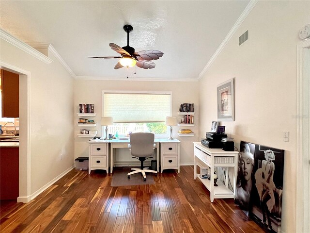 office area with crown molding, visible vents, dark wood-style flooring, baseboards, and ceiling fan