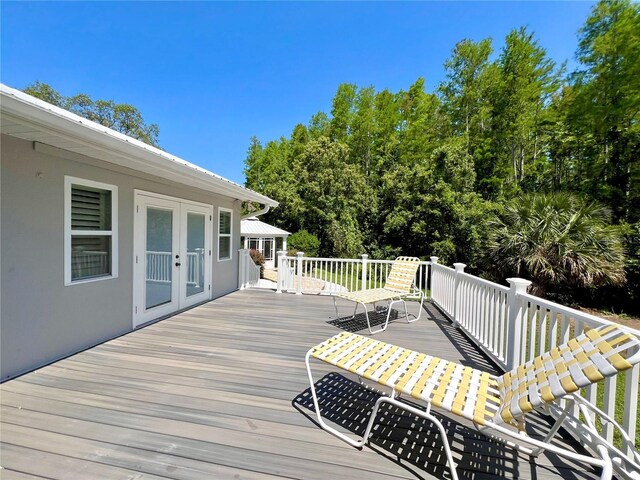 wooden deck with french doors