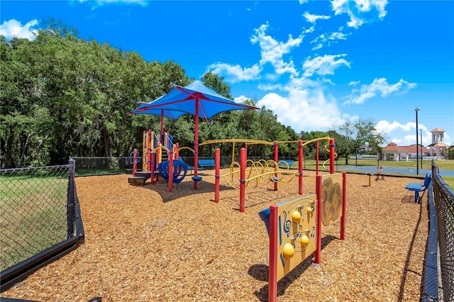 community playground featuring fence
