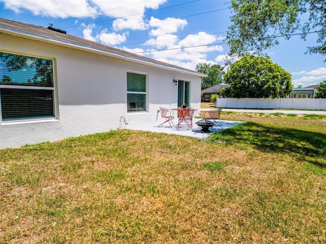 view of yard with a patio area and fence