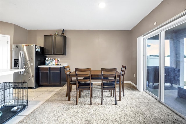 dining space with light tile patterned flooring