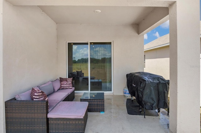 view of patio / terrace featuring area for grilling and outdoor lounge area