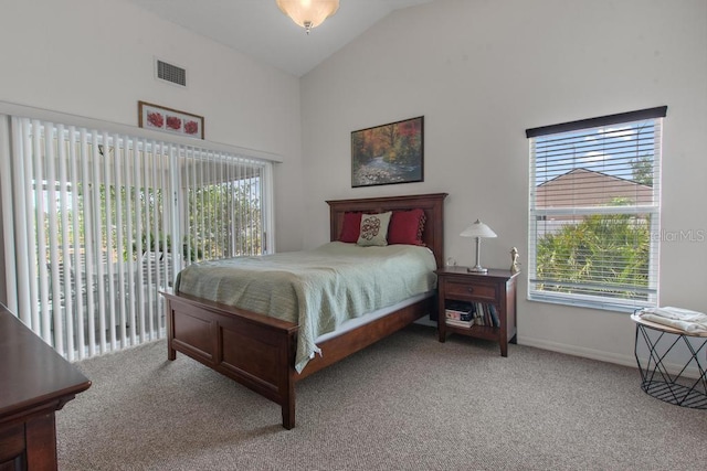 carpeted bedroom with visible vents, baseboards, access to exterior, and high vaulted ceiling