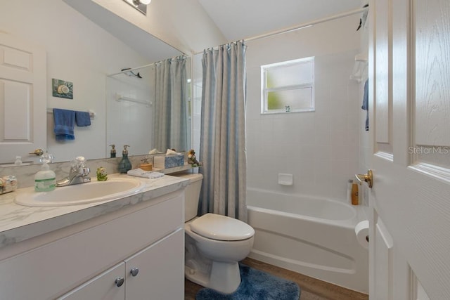 full bath with vanity, toilet, and shower / bath combination with curtain