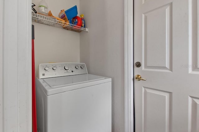 laundry area with washer / dryer and laundry area