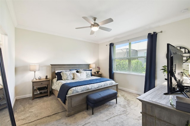 bedroom featuring a ceiling fan, baseboards, light carpet, and ornamental molding