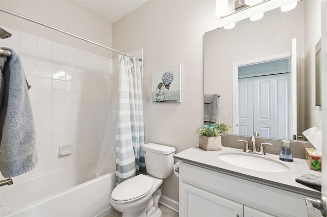 full bath with toilet, shower / tub combo, and vanity