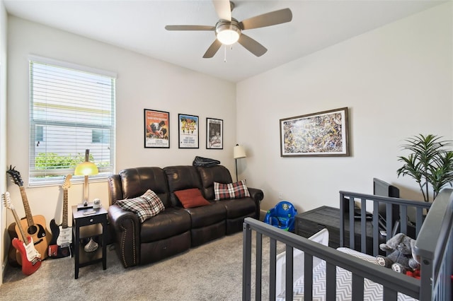 carpeted bedroom with a ceiling fan