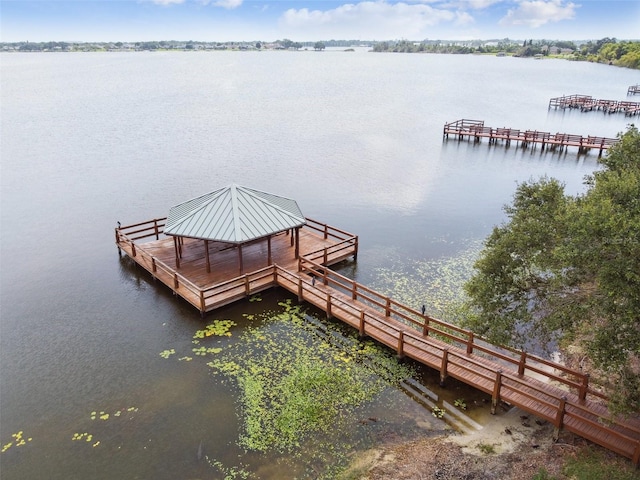 view of dock featuring a water view and a gazebo