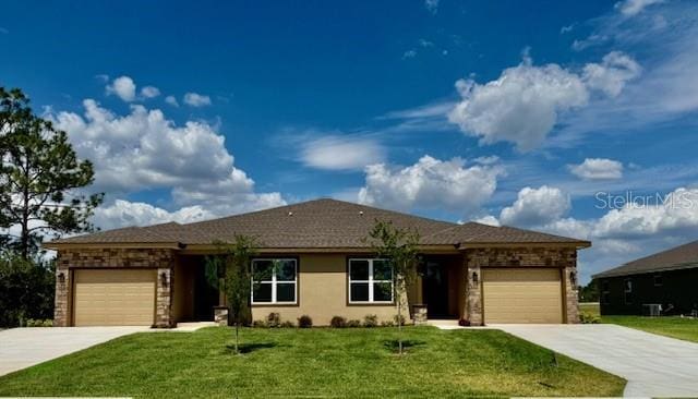 5275 Pebble Beach Dr, Sebring, FL 33872 - ranch-style home featuring a garage, concrete driveway, and a front yard