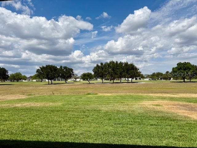 5275 Pebble Beach Dr, Sebring, FL 33872 - view of property's community with a lawn