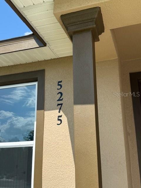 5275 Pebble Beach Dr, Sebring, FL 33872 - exterior details with stucco siding