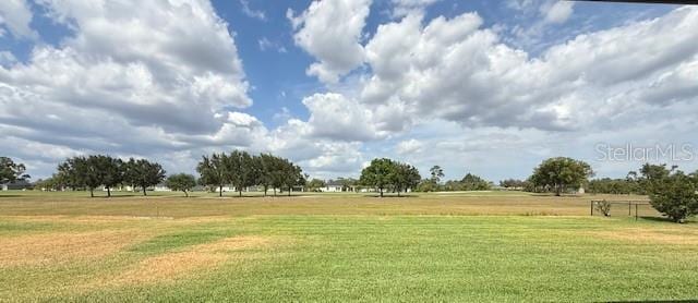 surrounding community with a lawn