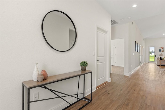 5277 Pebble Beach Dr, Sebring, FL 33872 - hall with wood finished floors and recessed lighting