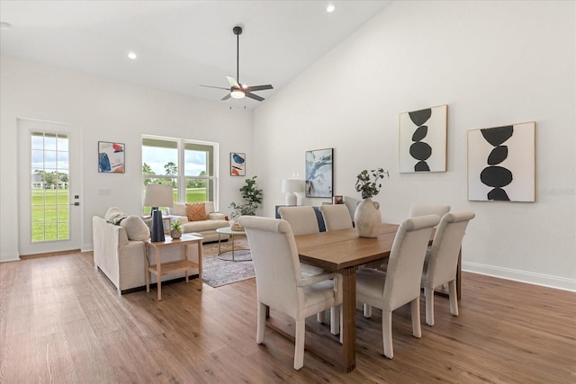 5277 Pebble Beach Dr, Sebring, FL 33872 - dining area with a ceiling fan, light wood-style flooring, high vaulted ceiling, and recessed lighting
