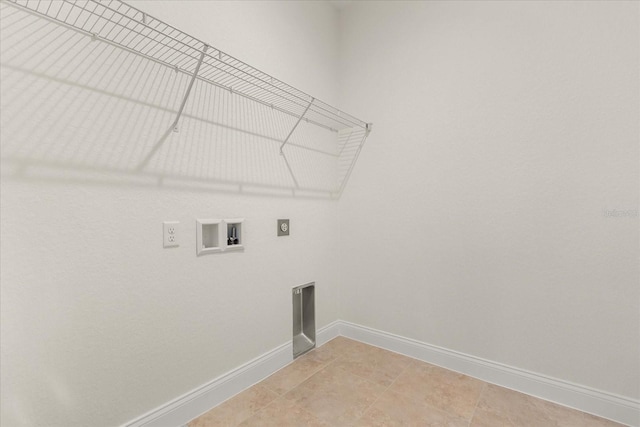 5277 Pebble Beach Dr, Sebring, FL 33872 - washroom with electric dryer hookup, washer hookup, and light tile patterned floors