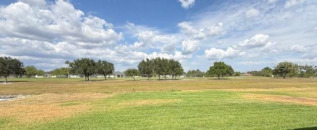 5273 Pebble Beach Dr, Sebring, FL 33872 - surrounding community with a yard