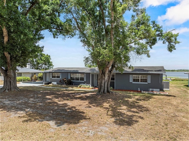 ranch-style home with a carport