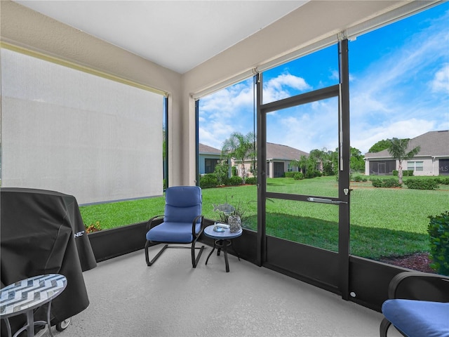 sunroom with a residential view