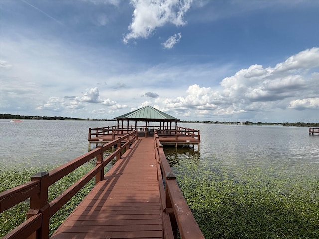 dock area with a gazebo and a water view