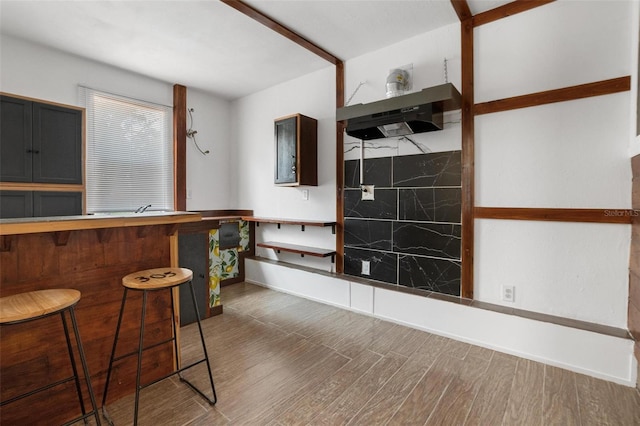 305 Armour Ave, Auburndale, FL 33823 - bathroom featuring wood finished floors and baseboards