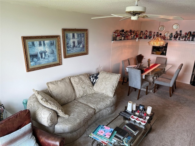 700 Mirror Ter NW Unit 303, Winter Haven, FL 33881 - carpeted living room with a textured ceiling and ceiling fan