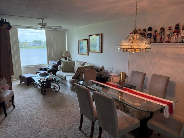 700 Mirror Ter NW Unit 303, Winter Haven, FL 33881 - carpeted dining room featuring ceiling fan