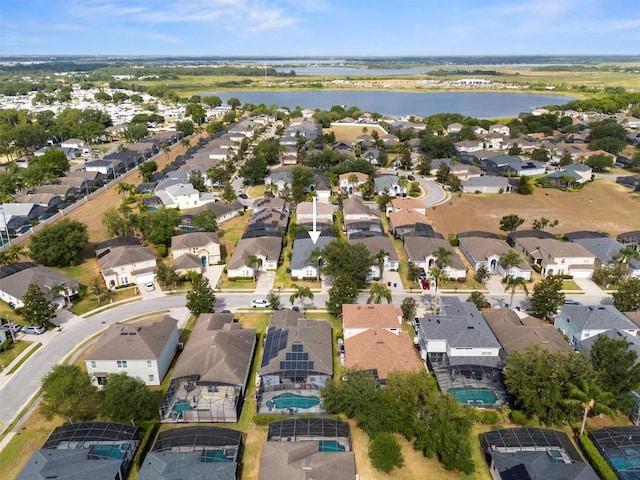 135 Minniehaha Cir, Haines City, FL 33844 - aerial overview of property's location featuring a nearby body of water and nearby suburban area