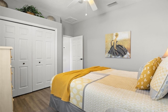 135 Minniehaha Cir, Haines City, FL 33844 - bedroom featuring wood finished floors, a closet, and ceiling fan