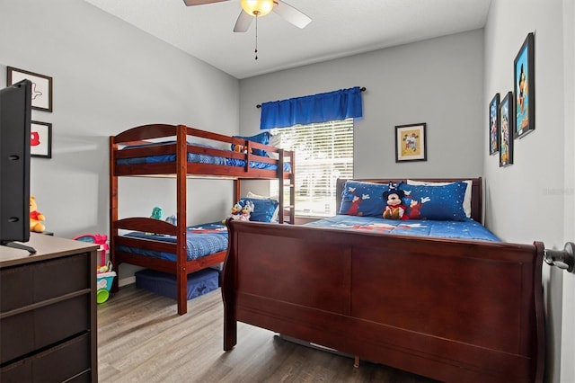 135 Minniehaha Cir, Haines City, FL 33844 - bedroom featuring wood finished floors and a ceiling fan
