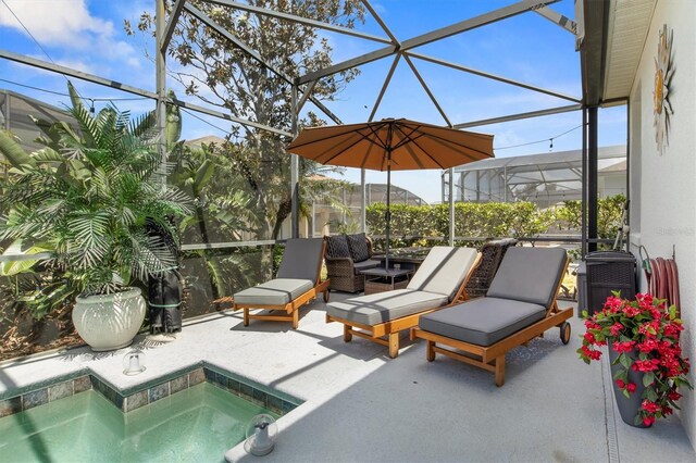 135 Minniehaha Cir, Haines City, FL 33844 - view of patio featuring a jacuzzi and glass enclosure