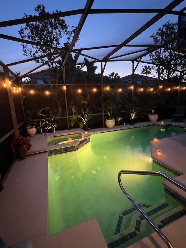 135 Minniehaha Cir, Haines City, FL 33844 - view of swimming pool with a patio, a lanai, and a pool with connected hot tub
