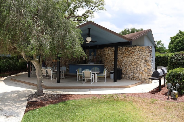 333 Lake Howard Dr NW Unit 103C, Winter Haven, FL 33880 - view of patio / terrace with a ceiling fan