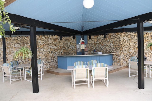 333 Lake Howard Dr NW Unit 103C, Winter Haven, FL 33880 - view of patio with outdoor dining space