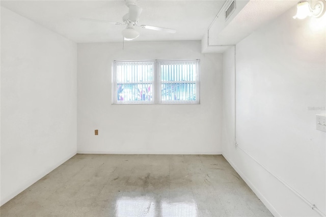 empty room featuring a ceiling fan